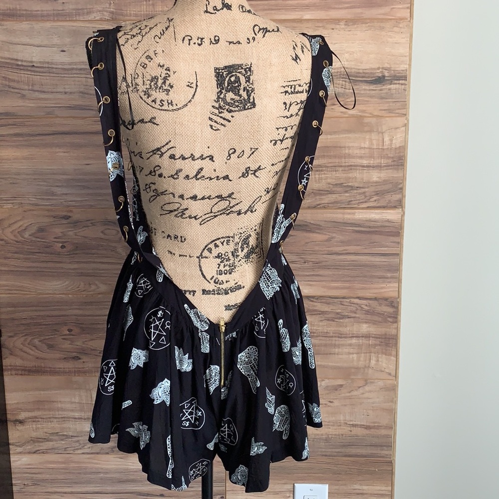Original Sin Romper with gold ring trim